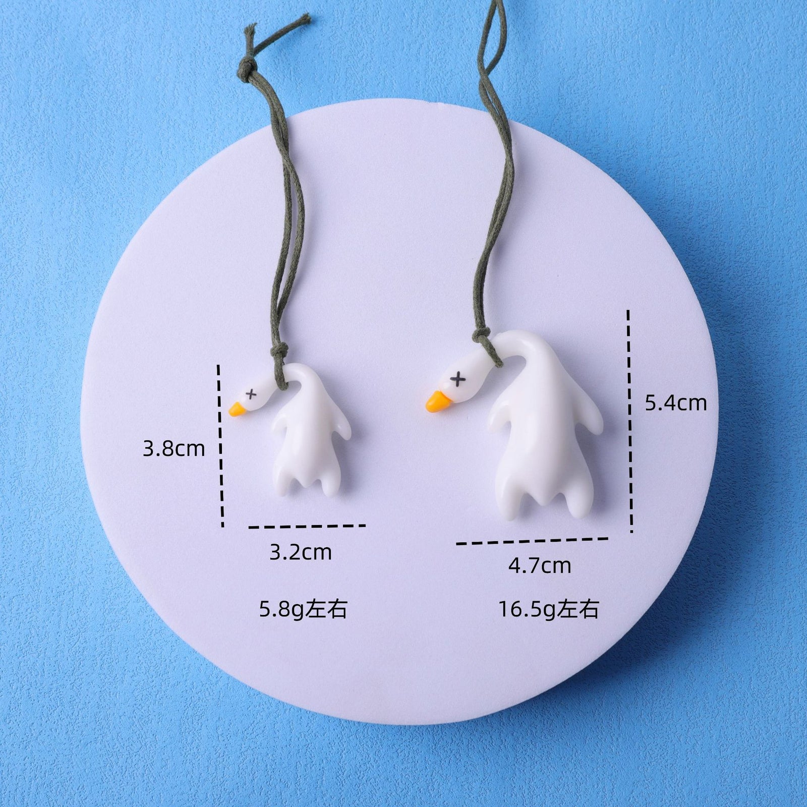 Shake the sound explosion key chain mobile phone pendant car pendant ultraviolet color roast duck temperature pendant wholesale